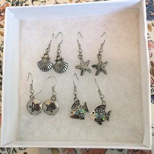 Four pairs of beach themed earrings